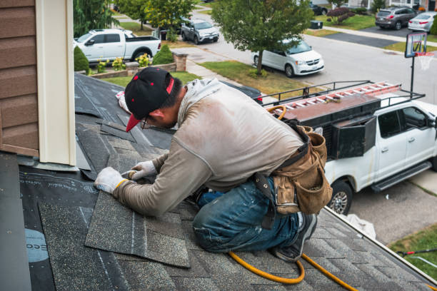 Professional Roofing technician working in Elberon, VA